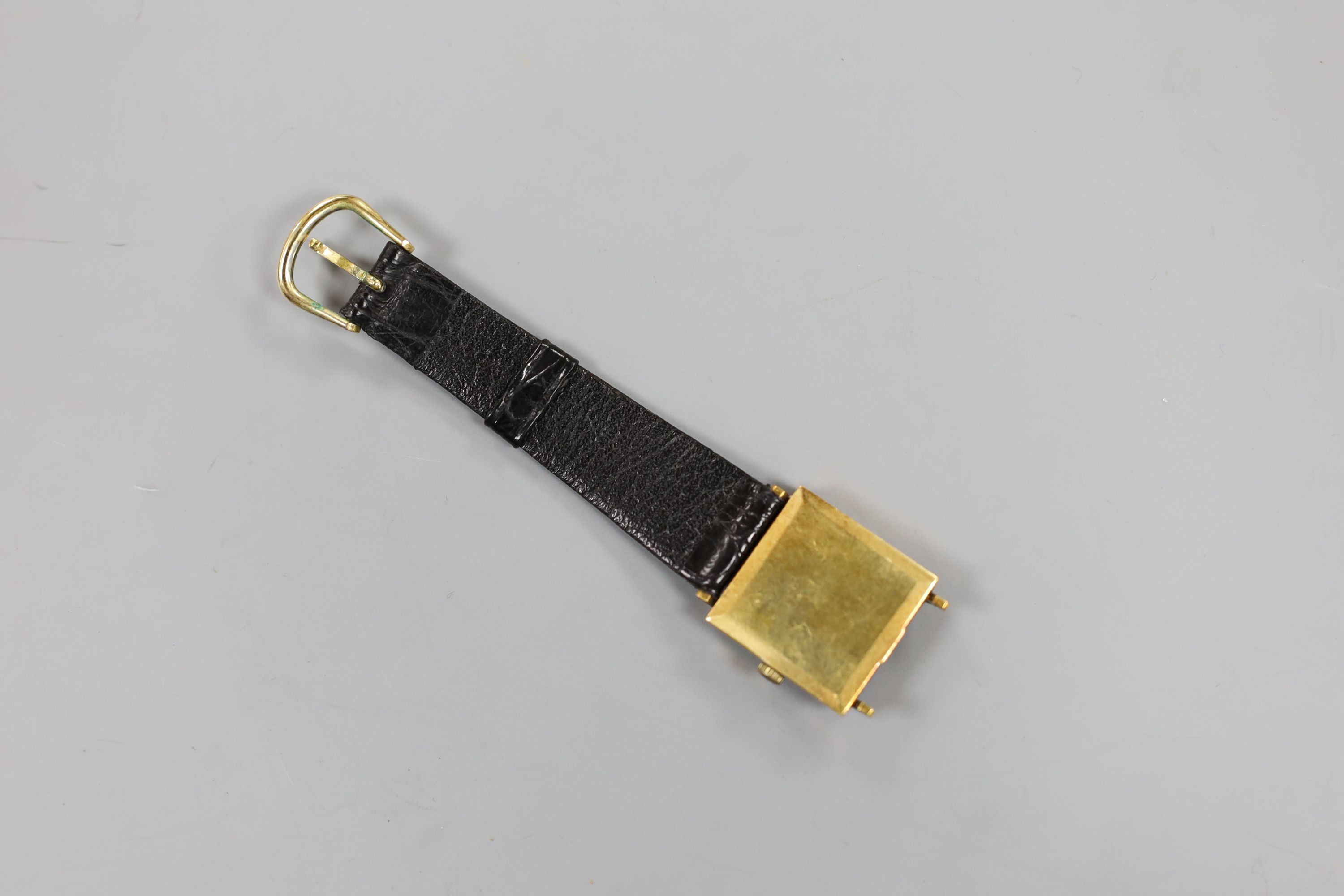 A gentleman's 1960's 18ct gold Longines manual wind dress wrist watch (part of strap missing), gross weight 22.5 grams.
